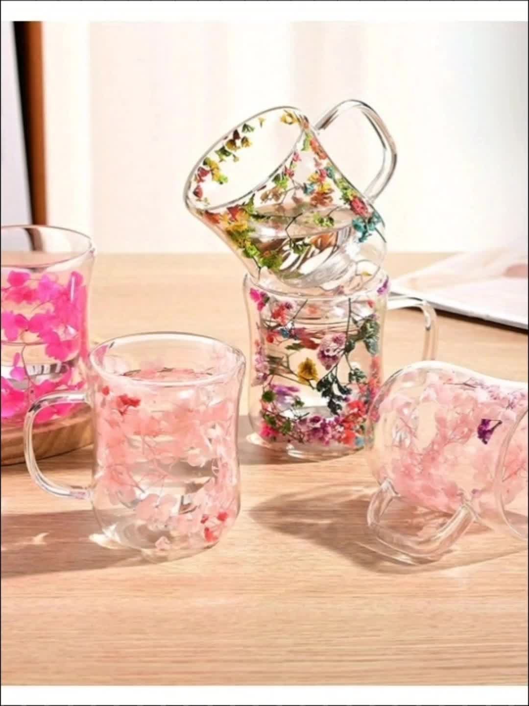 Glass coffee cup with dried flowers