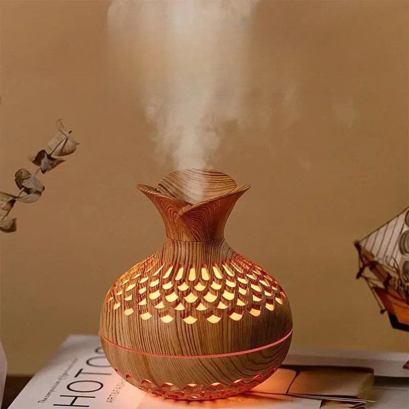 Essential oil diffuser with light and humidifier